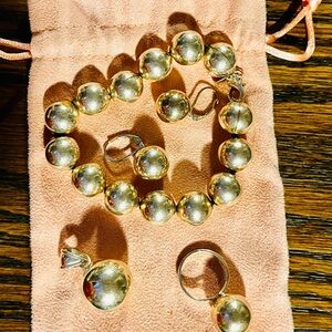 Elegant Sterling Silver Jewelry Set- Bracelet, earrings, ring, and pendant.